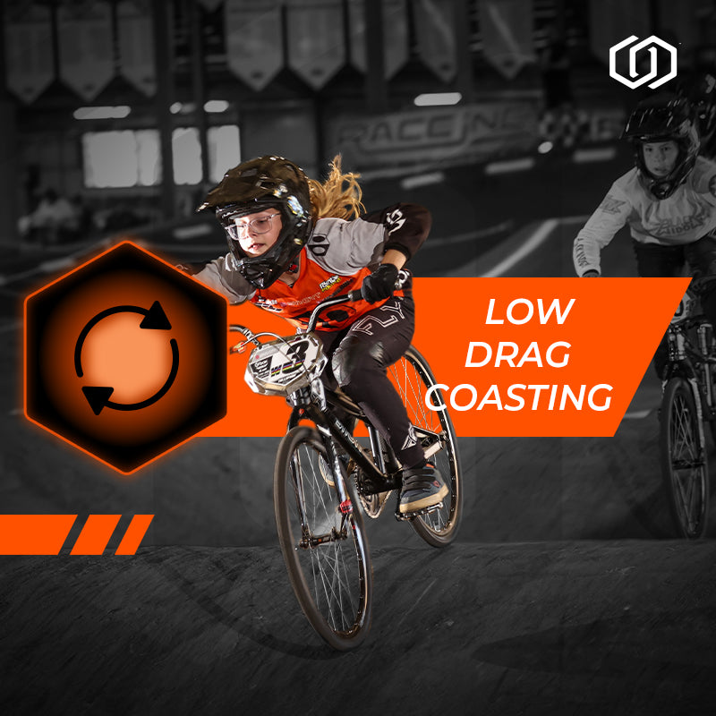 Biker in action with 'Low Drag Coasting' text and logo on a dark background