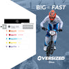 Biker in racing gear with 'BIG = FAST' text and 'Oversized' branding.